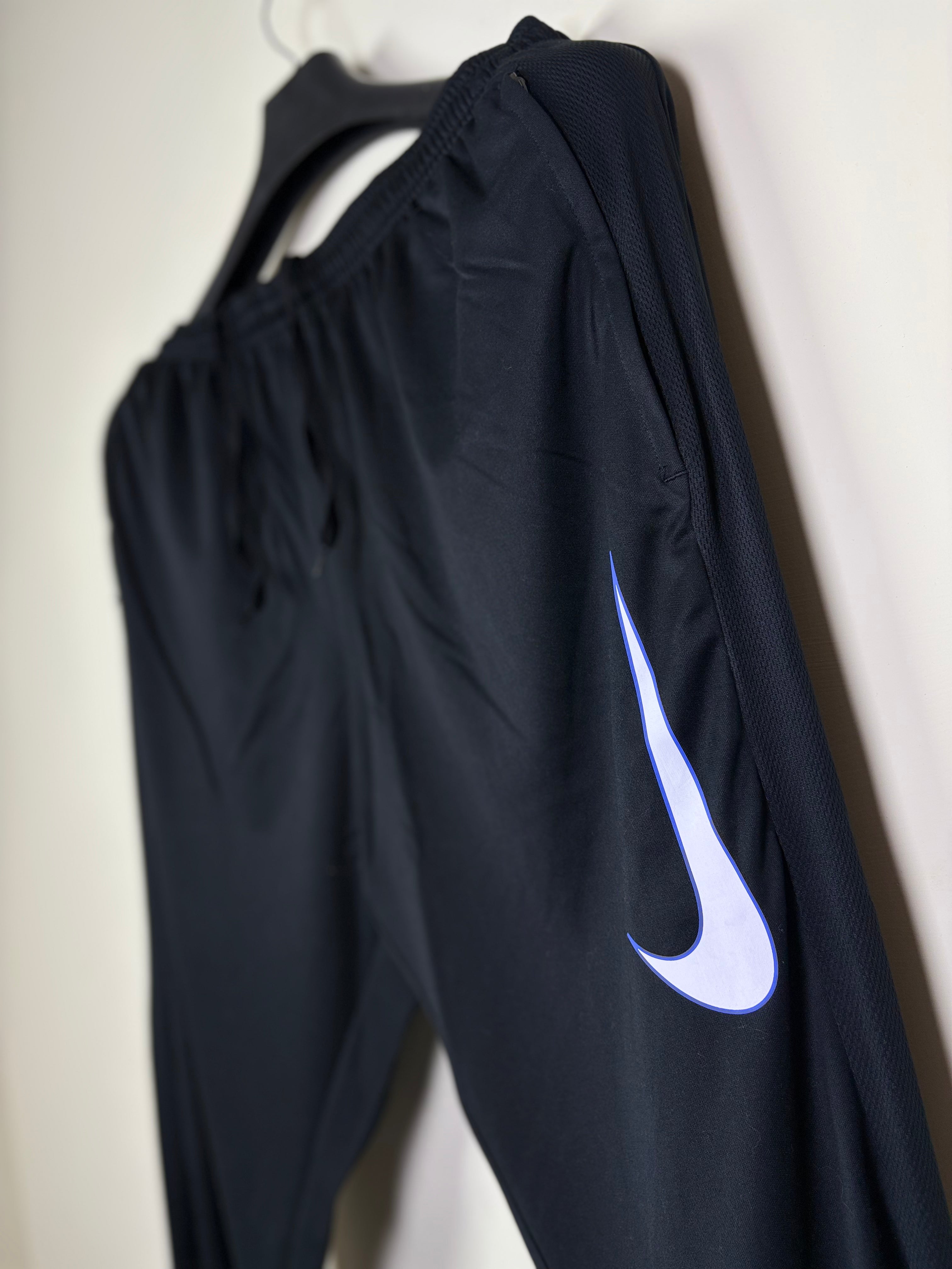 Nike Dri-FIT Men's Tapered Training Pants - Black with Reflective Swoosh & Mesh Ventilation